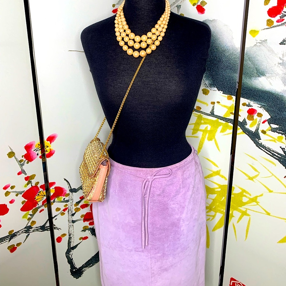 Suede lavender knee length skirt, attached string belt.